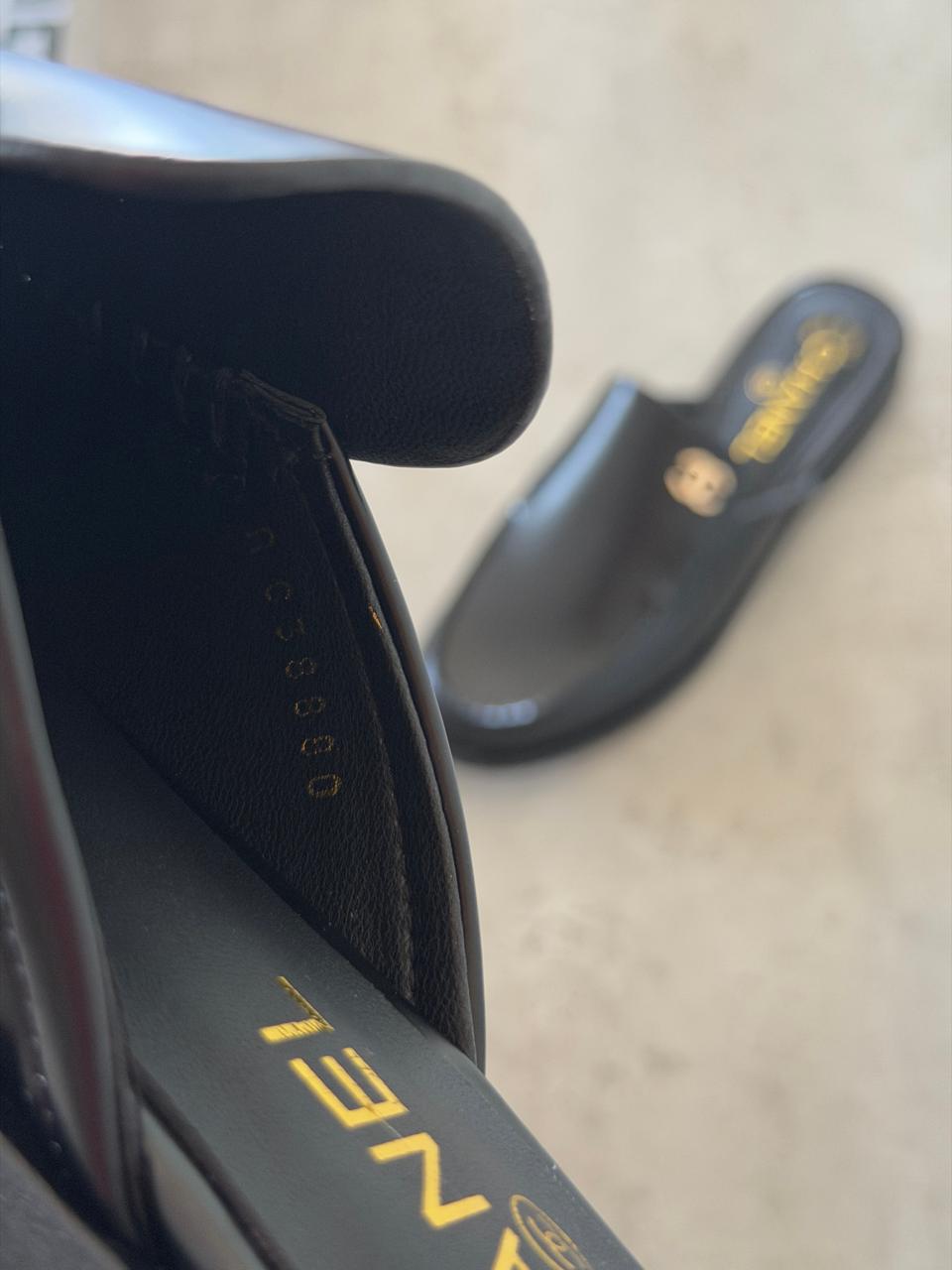 Chanel Mules in Black leather