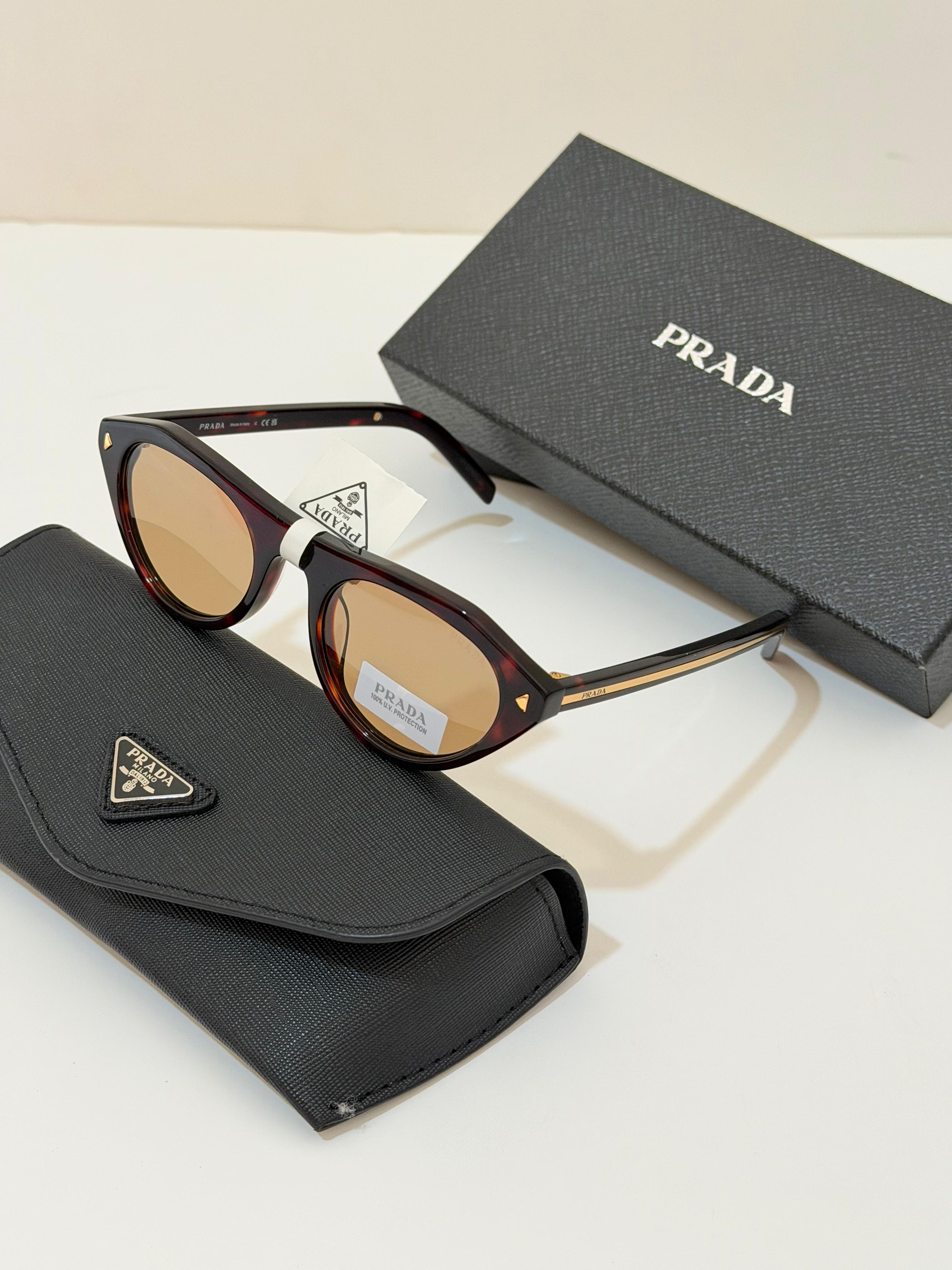 Prada Iconic metal plaque sunglasses